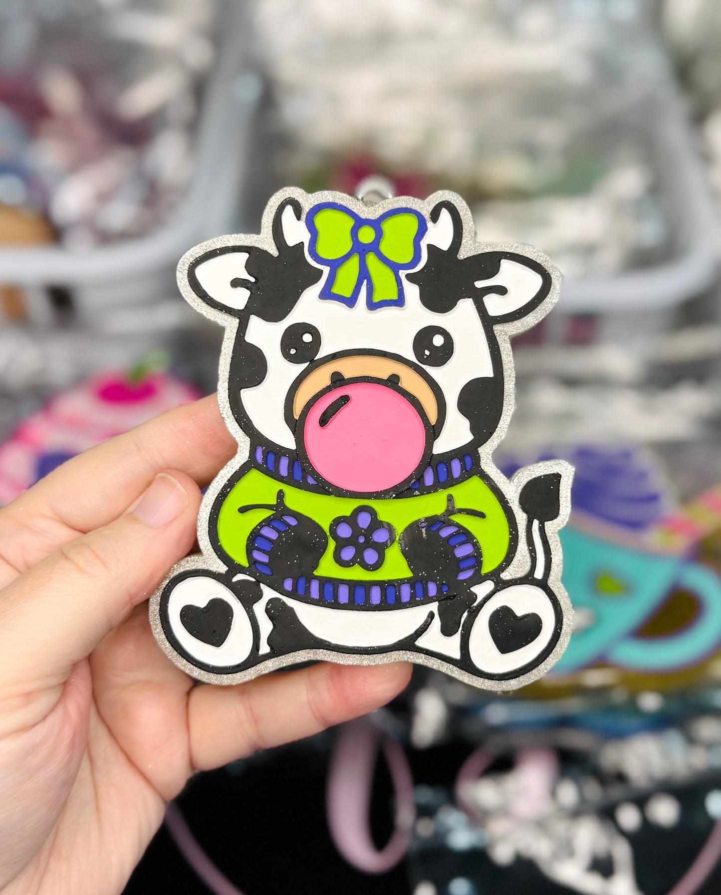 COW BLOWING BUBBLE IN HELLO BEAUTIFUL