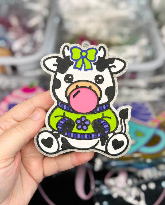 COW BLOWING BUBBLE IN HELLO BEAUTIFUL