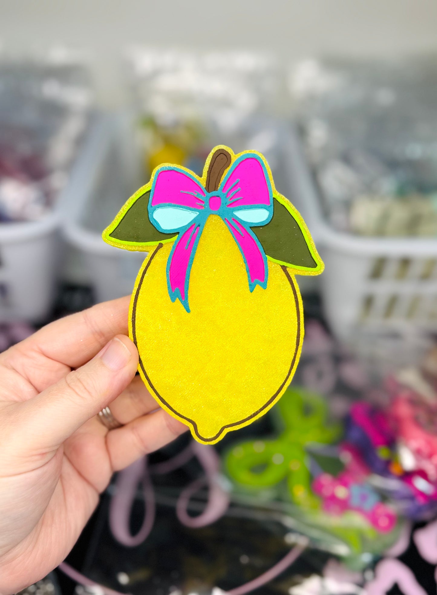 LEMON WITH A BOW IN UPPER CLASS AND TRAILER TRASH